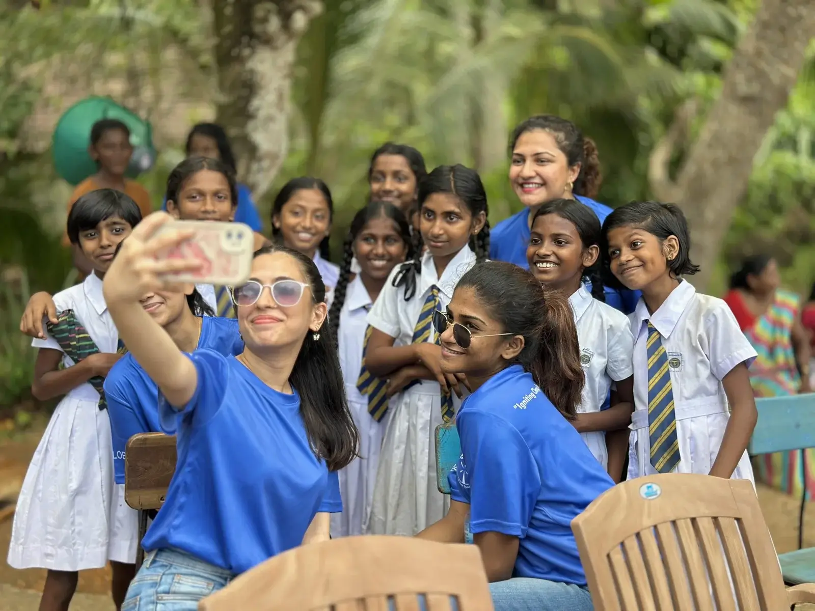 IOG Global team donating sports gear to support young athletes via Global Spark Foundation